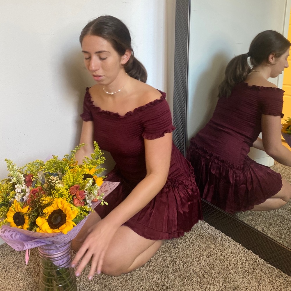 Donna Mizani off-shoulder mini dress